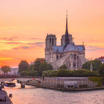 View of Notre-Dame of Paris, France, at sunset.