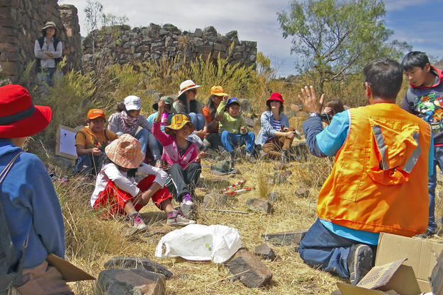 Schoolchildren from the nearby town of Andahuaylillas participate in an archaeological workshop at Rumiqolqa, 2013