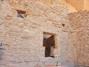 Cliff dwellings, typically built of adobe and stone, dot the canyons of Bears Ears National Monument, USA. 